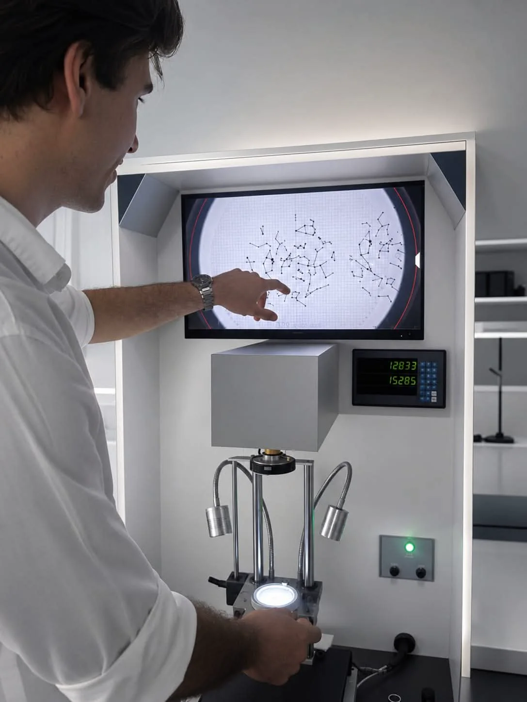 ChronoAstra founder inspecting a starmap watch